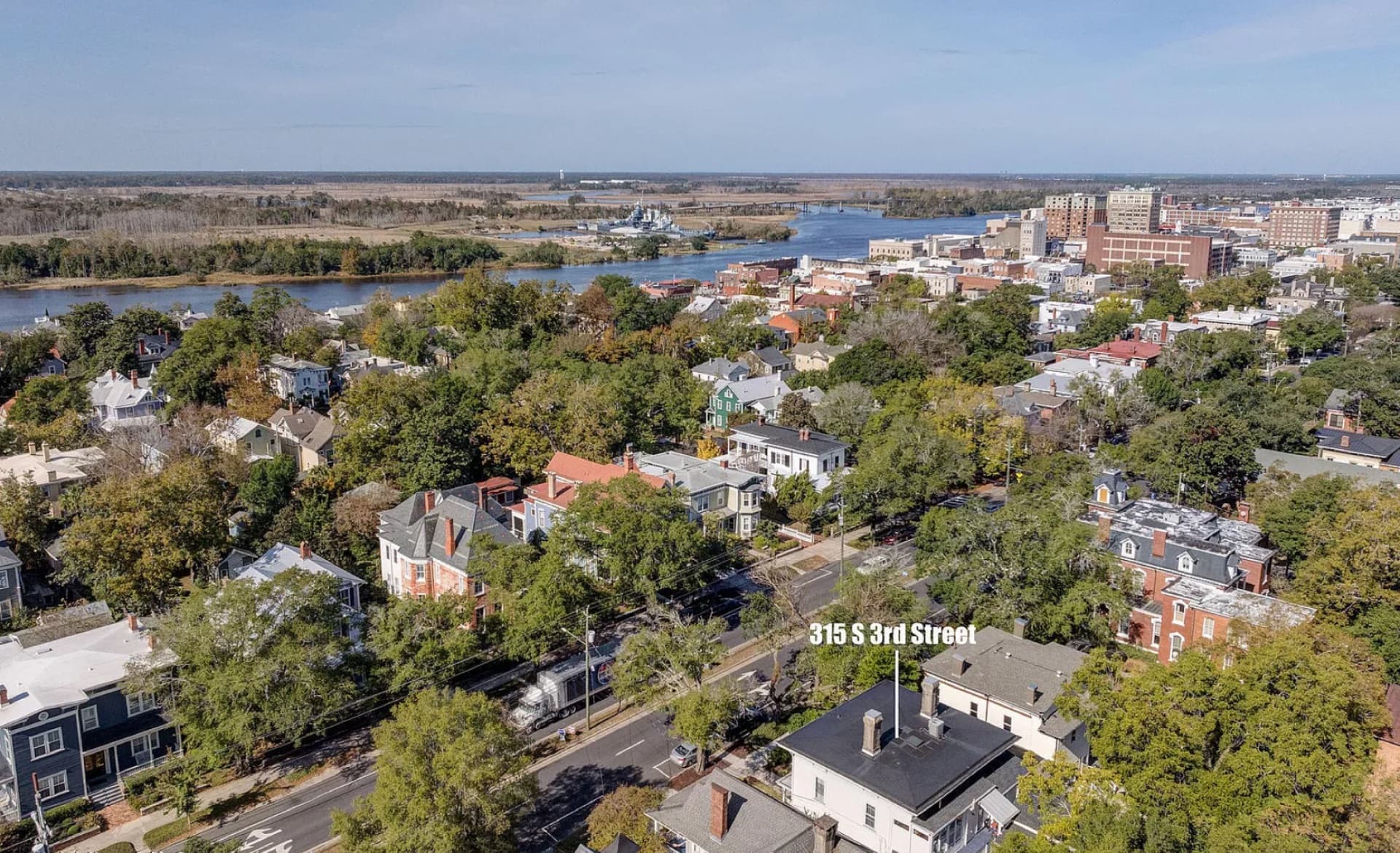 The Cape Fear Riverwalk waterfront in downtown Wilmington, NC, two blocks from Third & Oak Suites